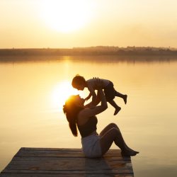 mom-spending-time-with-kid-beach
